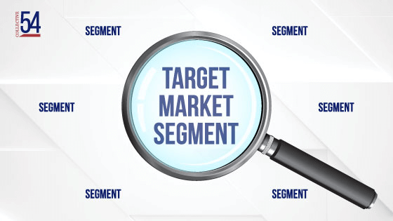 Magnifying glass over target market segment